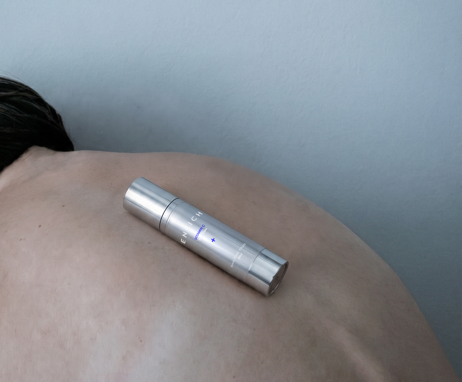 ENRICH Vitamin C Night Cream resting on skin — bring the clinic home
